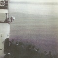 along the rail of the liberty ship