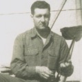 Unidentified soldier cleaning his rifle