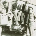 Men on back of M-8 Greyhound