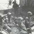 Gen. Bradley, II Corp Commander, drives by resting thunderbirds Caltanissetta, Sicily