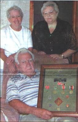 Anna Belle and Stephen Burbage Jr. of Monon, at left, along with their daughter Stardust Page ,157th Ingfantry Regiment Thunderbird veteran